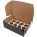 A black Baker's Mark cupcake box with 12 slots and a white reversible insert inside.