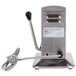 An Edlund Two-Speed Tabletop Heavy-Duty Electric Can Opener with a cable on a countertop.