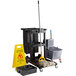 Lavex Janitorial Black Cleaning / Janitor Cart Kit with Gray Mop Bucket, Wet Floor Sign, Mop, and Caddy Main Thumbnail 2