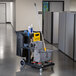 Lavex Janitorial Black Cleaning / Janitor Cart Kit with Gray Mop Bucket, Wet Floor Sign, Mop, and Caddy Main Thumbnail 1