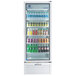 A Beverage-Air white glass door refrigerator full of drinks.