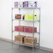 A Metro Super Erecta wire shelf with boxes on top.