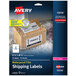 A box of Avery white waterproof shipping labels with a label on it.