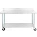 A white rectangular stainless steel work table with wheels and a shelf.