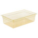 A Cambro amber high heat plastic food pan with a lid.