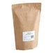 A brown bag of Numi Organic Gunpowder Green Loose Leaf Tea with a white label.