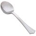 A close-up of a WNA Comet stainless steel look heavy weight plastic soup spoon with a handle.