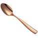 A close-up of the rose gold handle of a Bon Chef Manhattan spoon.