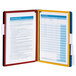 A Durable VARIO wall-mount reference system with a blue and yellow cover folder on it.