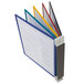 A Durable VARIO wall reference system with several folders and colored tabs.