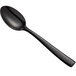 A black Bon Chef stainless steel spoon with a handle.