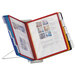 A Durable expandable desktop reference system with multi-colored pages and assorted borders.