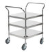 A Regency stainless steel three shelf utility cart on wheels.