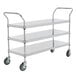 A Regency stainless steel three shelf utility cart on wheels.