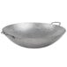 A large metal Town hand hammered Cantonese wok with handles.