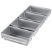 A silver rectangular Chicago Metallic bread loaf pan with four compartments.