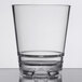 A clear Libbey Infinium plastic double rocks glass with a small bottom.