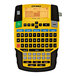 A yellow and black DYMO Rhino 4200 label printer keyboard and screen.
