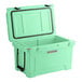 A CaterGator seafoam green cooler with the lid open.