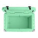 A seafoam green CaterGator outdoor cooler with a white lid and black handles.