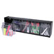 A black Deflecto interlocking tilt-bin organizer on a counter filled with different colored pens and pencils.