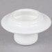 A white Tuxton china teapot lid with a round knob.