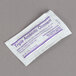A white Medi-First packet with purple text for triple antibiotic cream.