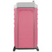 A pink and white PolyJohn portable toilet with silver metal accents.