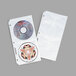 A C-Line clear polypropylene binder page with 4 CD pockets, holding 4 CDs.