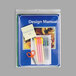 A presentation manual with a set of pens and scissors in a C-Line Industrial Clear Envelope.