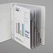 A white binder with a chart and graph in C-Line sheet protectors.