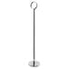 A Choice chrome metal table card holder with a round base and pole.