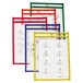 A group of C-Line reusable dry erase folders in four different primary colors with writing on them.