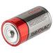 A red Rayovac Fusion D battery.