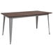 A Flash Furniture rectangular dining table with a rustic walnut wood top and silver metal legs.