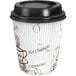 A white 10 oz. paper coffee cup with brown bean print and a black lid.