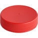 A red plastic flat top spice lid with induction liner and a hole in the middle.