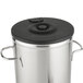 A stainless steel Bloomfield 3 gallon iced tea dispenser with a black lid.