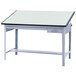 A white drafting table with a green top.