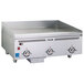 A stainless steel Vulcan commercial griddle with two atmospheric burners and a large metal surface.
