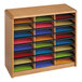 A wooden Safco file organizer with many colored folders.