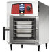 A Vulcan Mini-Jet electric combi oven with trays inside.