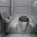 A grey PolyJohn portable restroom with a black seat and sink.