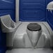 A dark blue PolyJohn portable restroom with a sink, soap, and towel dispenser.