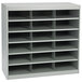 A gray Safco steel mail sorter with 18 compartments.