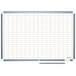 A MasterVision white board with a grid on it.