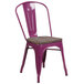 A purple Flash Furniture metal restaurant chair with a wooden seat and vertical slat back.