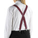 A person wearing burgundy Henry Segal clip-end suspenders.