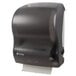 A black San Jamar Simplicity Essence mechanical paper towel dispenser with a roll of paper towels inside.