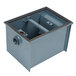 A Watts WD-7-THD grease trap, a metal box with a hole in it.